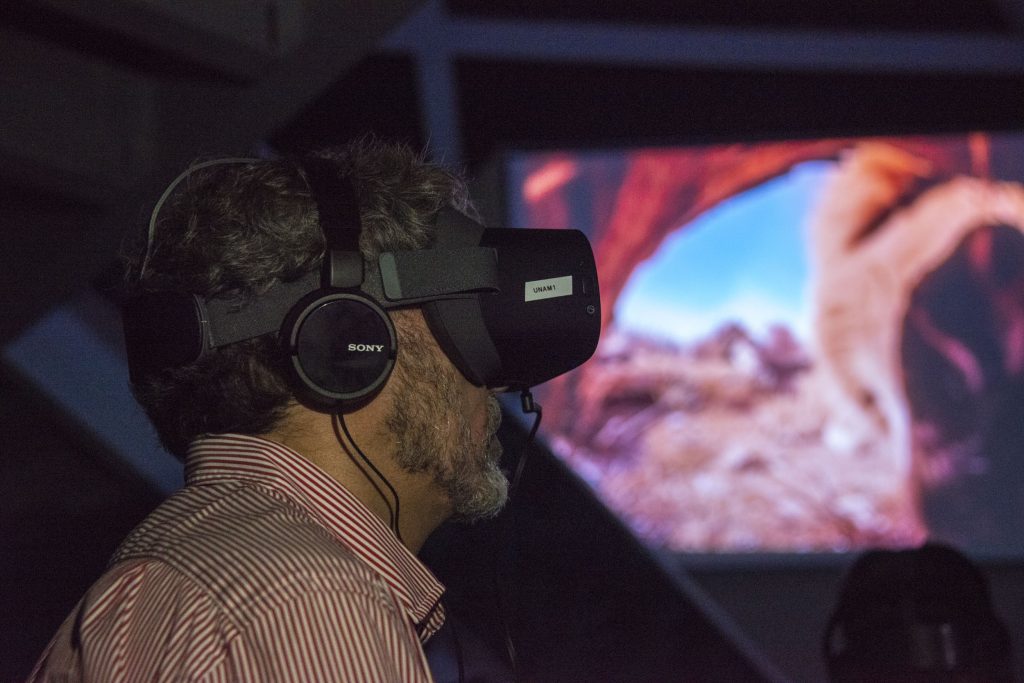 man watching a VR immersive movie in a Pico headset
